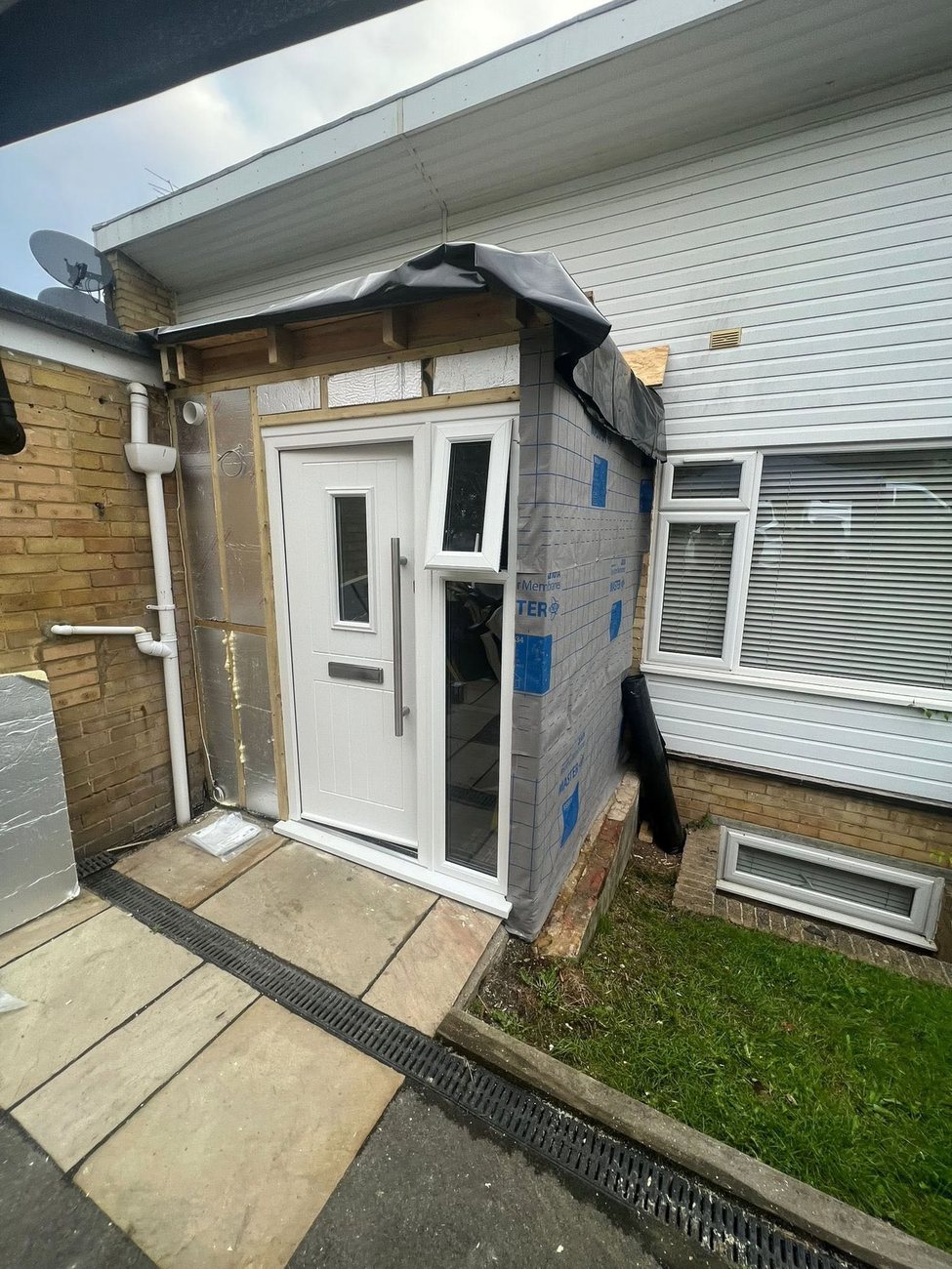 The original porch entrance before GRF Construction rebuilt it