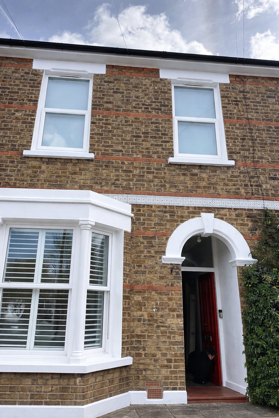 A period Kent home finished by GRF Construction with freshly painted bay windows and rendered frontage